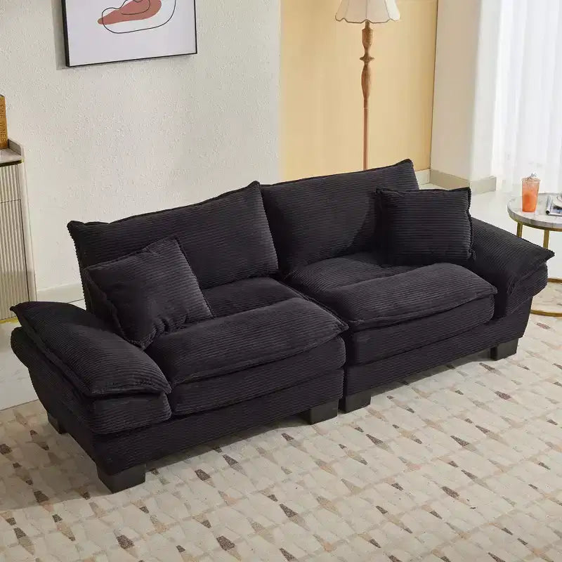 Divanetto letto in velluto a coste, profondo e imbottito, con cuscini