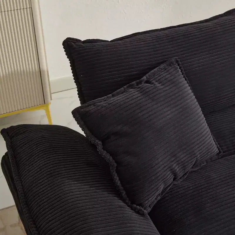 Divanetto letto in velluto a coste, profondo e imbottito, con cuscini