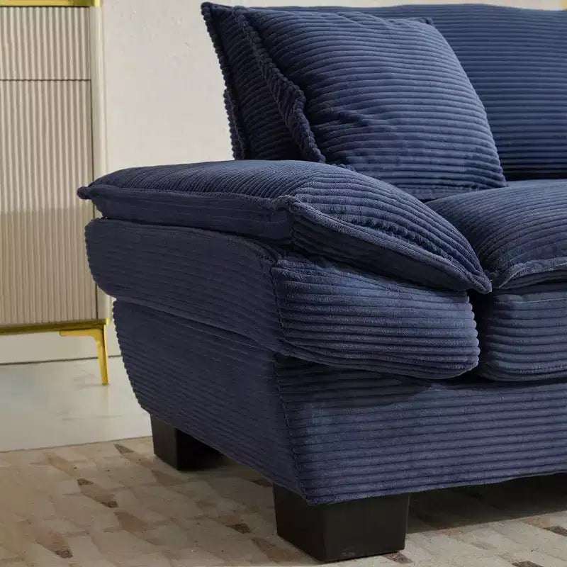 Divanetto letto in velluto a coste, profondo e imbottito, con cuscini