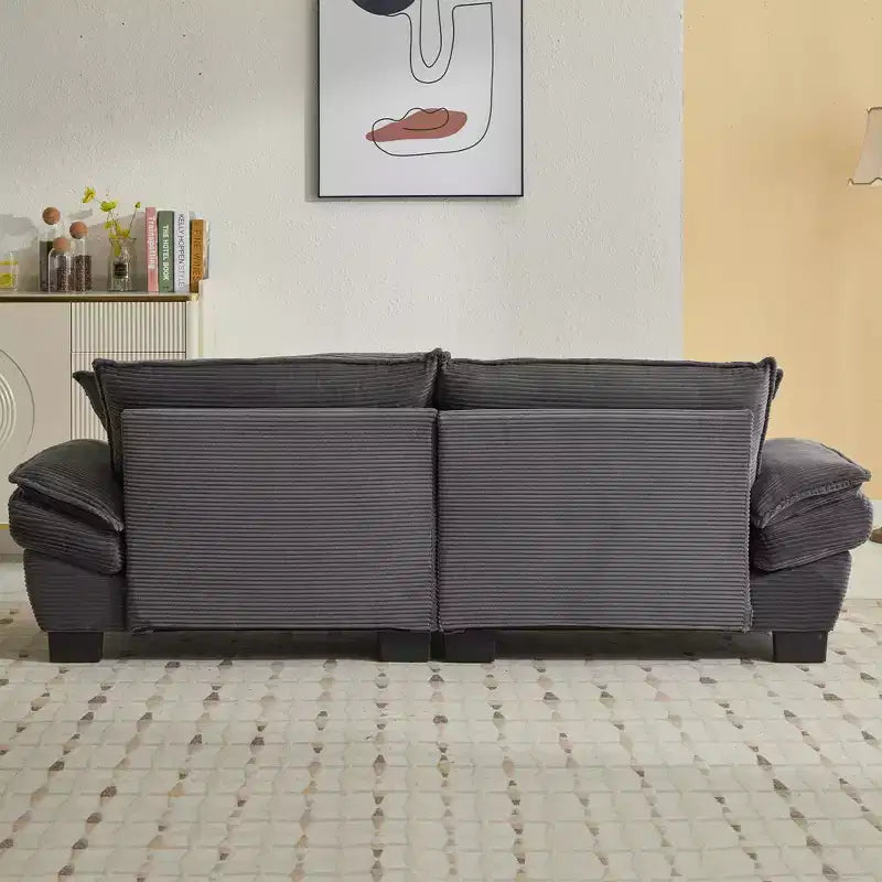 Divanetto letto in velluto a coste, profondo e imbottito, con cuscini