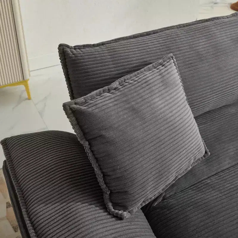 Divanetto letto in velluto a coste, profondo e imbottito, con cuscini