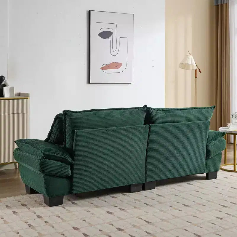 Divanetto letto in velluto a coste, profondo e imbottito, con cuscini