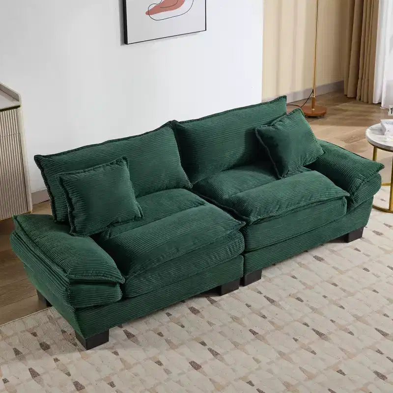 Divanetto letto in velluto a coste, profondo e imbottito, con cuscini