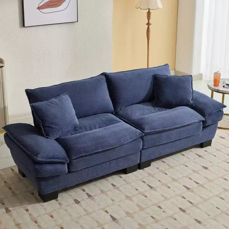 Divanetto letto in velluto a coste, profondo e imbottito, con cuscini