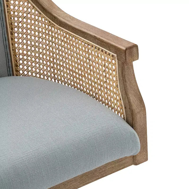 Sedia da lavoro girevole con braccioli in rattan e cuscino in misto lino naturale e schiuma